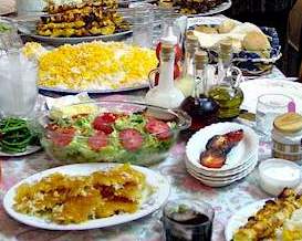 A Persian Feast with safron rice, kababs, salad, breads and more