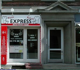 The outside of a Kabab Bar with happy smiling chefs next to the Express sign