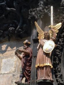 Angel and wiseman statues on Astronomical clock