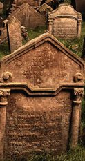 Close-up of tombstone with Hebrew inscription